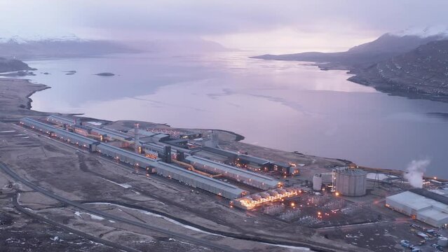 Big aluminium industry factory facility during cloudy morning, Rey&eth;arfj&ouml;r&eth;ur fjord