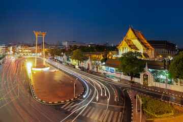 Fototapeta na wymiar The Giant Swing with Temple of Buddha at dusk (Bangkok, Thailand)