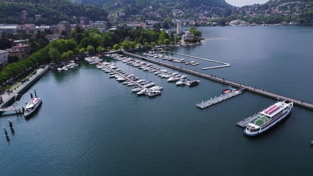 Yachts and Boats in Harbor of Beautiful Lake Como, Italy - Aerial TIlt-up