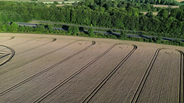 Strange Micheldever Station geometric wheat field crop circle aerial view dolly left reveal