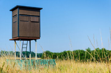 Animal watching tower on the field.