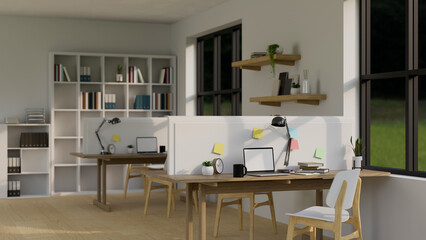 Modern minimal office co-working space interior design with minimal office desk and office supplies.