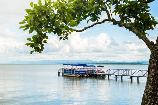 Tour boats stand by pier on Paliastomi lake in summer outdoors. Attraction in Georgia . Famous sightseeing destination in Georgia