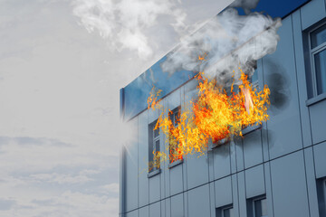 Modern building engulfed in flames. Fire safety violations