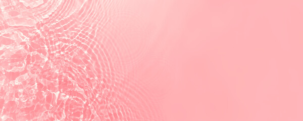 Fresh water background. Bright pink color pattern with natural rippled water texture. Cosmetic backdrop. Web banner with copy space.