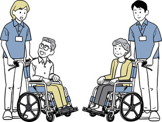 車椅子に乗るお年寄りと介護士