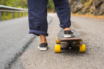 feet of a girl on a skateboard