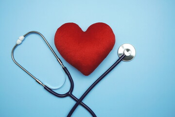 Heart and Stethoscope with space copy on blue background