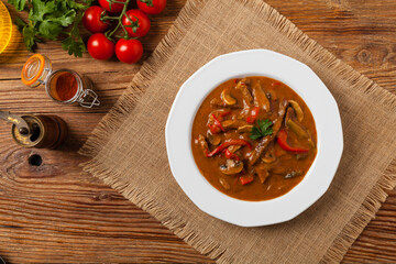 Boeuf, Stroganow, Strogonow. Classic, Russian beef stew. Served on a white plate. Top view. Natural background.
