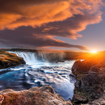 Scenic image of Iceland at sunset. Godafoss, One of the most famous waterfalls in Iceland. Amazing nature scenery. Iconic location for landscape photographers. Travel concept. Artistic Creative image. © jenyateua