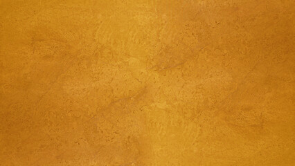 Abstract yellow golden marbled spotted stone wall texture background