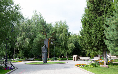 Monument to Fyodor Mikhailovich Dostoevsky in the historical center of Omsk in summer
