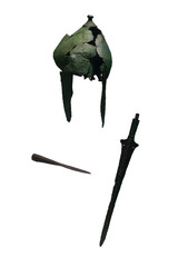Bronze hemlet with cheek-guards and raised peak for attaching a crest an bronze spearhead and sword. Isolated objects on white background