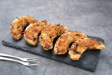 Banana Milk Pastry, made from banana, milk, eggs, flour with grated cheese and chocolate.
