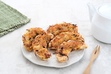 Banana Milk Pastry, made from banana, milk, eggs, flour with grated cheese and chocolate.
