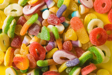 Overhead full frame view of multi colored sugar candies pile