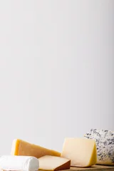 Foto op Plexiglas Various cheese against white background with copy space © WavebreakMediaMicro