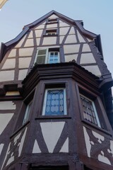 Low-angle shot of a beautiful building in the streets of Colmar, France