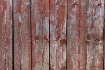 Fototapeta na wymiar background in the form of a plank wall with burgundy paint