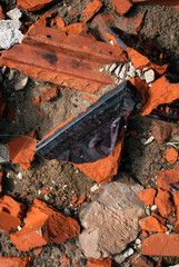 Broken old vintage ceramic tiles for decoration stoves and fireplaces. Background, texture
