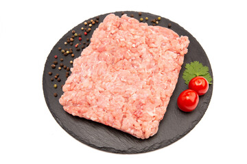 Raw minced rabbit meat on a cutting board. Isolate.