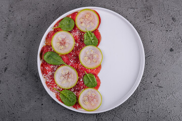 Italian beef carpaccio with sliced zucchini