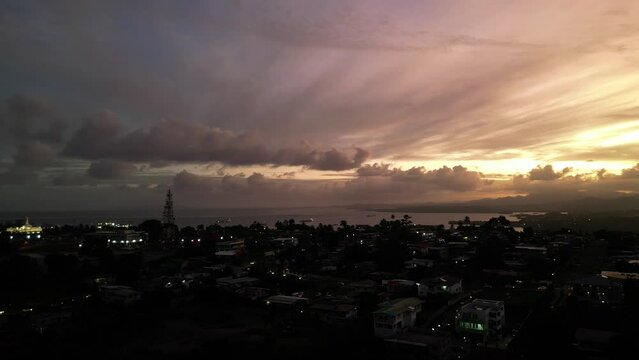 Aerial drone footage of Suva at sunset. Capital of Fiji.