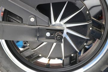 Real wheel of an electric sports bike with modern style spokes