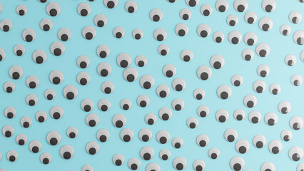 Playful fun googly eyes on blue background