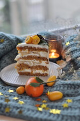 white cake on a plate with kumquat on top