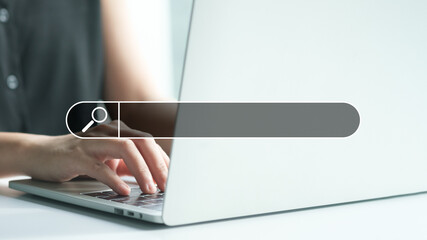 Data Search Technology SEO Search Engine Optimization or job search concept. Hands using typing on laptop computer keyboard surfing the internet to search for information on web browser.