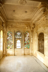 Fototapeta na wymiar Beautiful jali windows inside of the city palace in Udaipur
