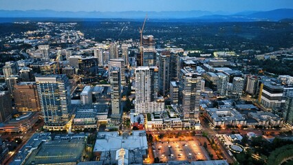 Aerial drone shot of the cityscape of Bellevue, Washington, in the evening