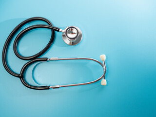Medical stethoscope. Stethoscope on a blue background close-up.