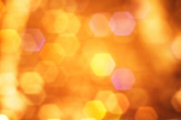 Fototapeta premium Orange background with hexagon bokeh