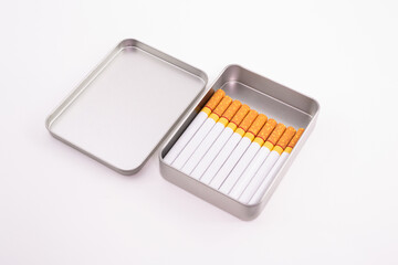 Cigarette in metal box. smoking cigarettes . cigarette filter tubes