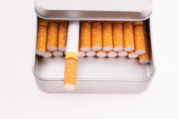 Cigarette in metal box. smoking cigarettes . cigarette filter tubes