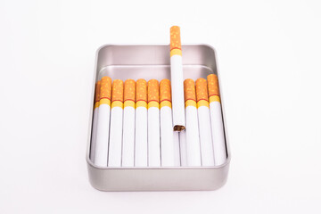 Cigarette in metal box. smoking cigarettes . cigarette filter tubes
