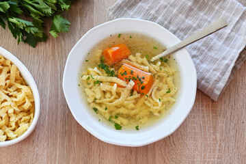 Turkey broth with noodles in a bowl