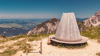 Beautiful alpine summer view with a wooden carousel hat at the famous Fuessener Joechle summit,...