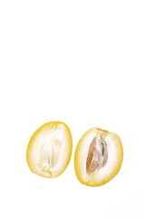 yellow raw dates isolated on white background