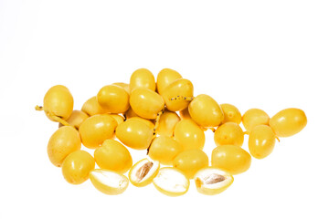 yellow raw dates isolated on white background