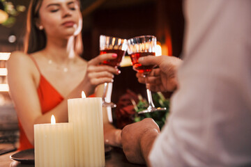Cute romantic couple have dinner in the restaurant