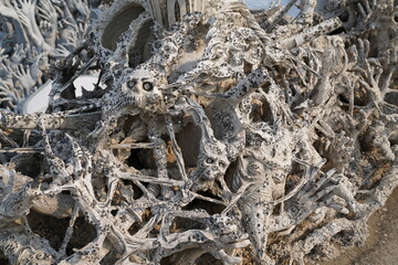 Wat Rong Khun is a white Buddhist temple located near the city of Chiang Rai in Thailand