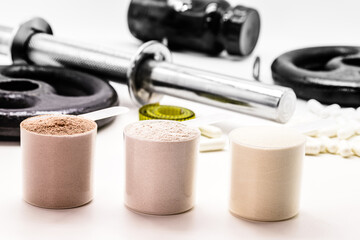 Creatine or whey food supplement, sports supplement, creatine, hmb, bcaa, amino acid or vitamin powder. Sports nutrition concept. bcaa, l-carnitine, creatine