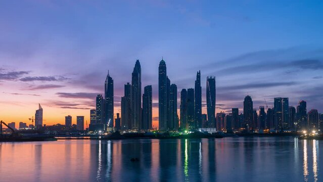 Time lapse of  beautiful sunrises with high rise building  in Dubai Marina.