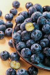 Fresh blueberries on a wooden background