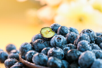 Fresh blueberries on a wooden background
