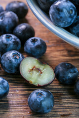 Fresh blueberries on a wooden background
