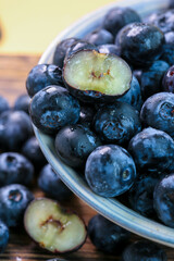 Fresh blueberries on a wooden background